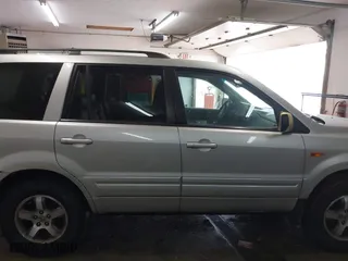 2008 Honda Pilot EX-L with VIN 5FNYF18758B006821, listed as a IAAI auction lot 41642008 with 195,678 mi miles. Bid and sale history available at carsss.com. Image 14.