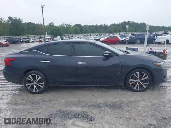 2016 Nissan Maxima Platinum with VIN 1N4AA6AP9GC408480, listed as a IAAI auction lot 42383732 with 145,412 mi miles and . Bid and sale history available at DreamBid. Image 13.