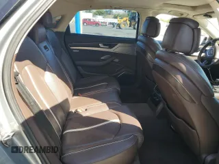 2012 Audi A8 z VIN WAURVAFD7CN023286, wystawiony jako Copart lot #56594745 z przebiegiem 199 443 mil mil oraz Czysty tytuł • Clean title. Historia ofert i sprzedaży dostępna na DreamBid. Obrazek 10.