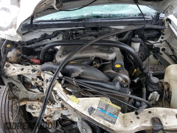 2002 Chevrolet Tracker ZR2 с VIN 2CNBJ734726925605, выставлен на аукционе Copart как лот 60070915 с пробегом Не указан миль и Списание • Salvage title. История ставок и продаж доступна на DreamBid. Изображение 11.
