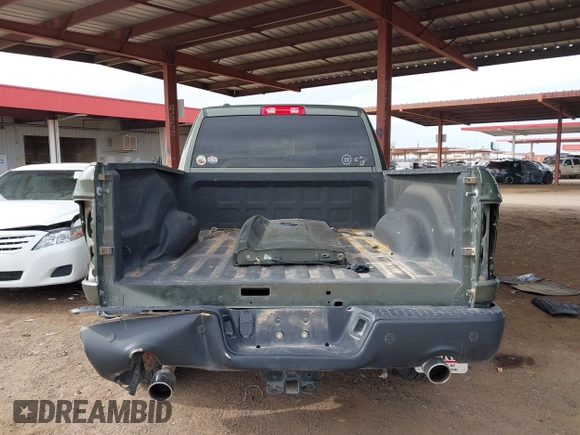 2021 Ram 1500 Warlock with VIN 1C6RR7GT0MS583144, listed as a IAAI auction lot 41776771 with 27,152 mi miles and . Bid and sale history available at DreamBid. Image 6.