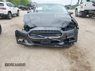 2016 Ford Fusion Titanium with VIN 3FA6P0D97GR133823, listed as a IAAI auction lot 42429708 with 166,105 mi miles and . Bid and sale history available at DreamBid. Image 6.