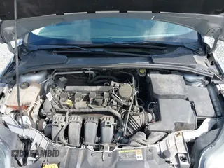 2014 Ford Focus Titanium with VIN 1FADP3N20EL160982, listed as a IAAI auction lot 42565322 with 112,551 mi miles and . Bid and sale history available at DreamBid. Image 10.