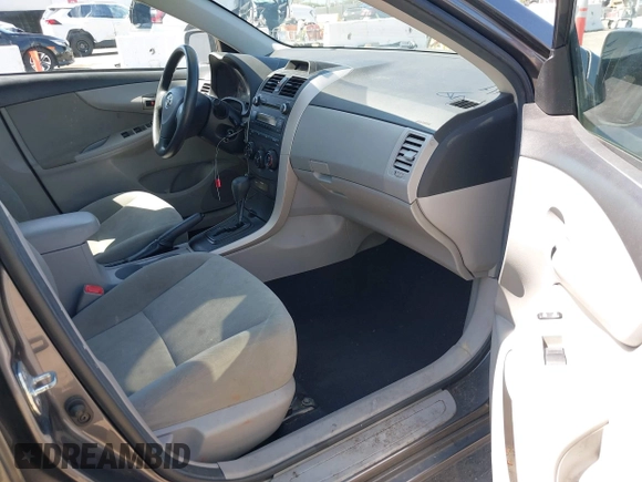 2012 Toyota Corolla L with VIN 5YFBU4EEXCP054988, listed as a IAAI auction lot 41973361 with 193,390 mi miles. Bid and sale history available at carsss.com. Image 5.
