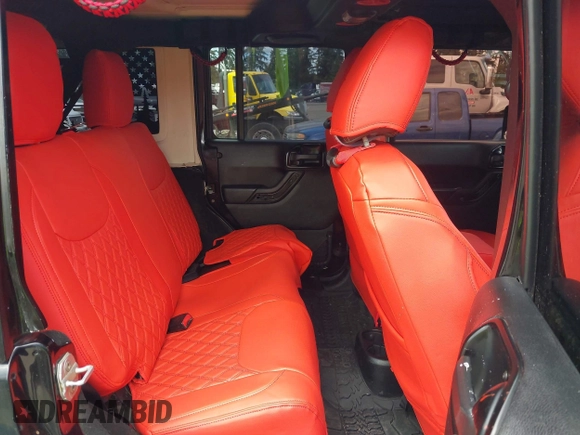 2014 Jeep Wrangler Unlimited Sahara with VIN 1C4BJWEG6EL107526, listed as a IAAI auction lot 42030244 with 69,077 mi miles. Bid and sale history available at carsss.com. Image 8.