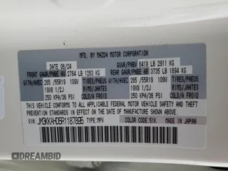 2024 Mazda CX-90 Select z VIN JM3KKAHD5R1187895, wystawiony jako Copart lot #53903385 z przebiegiem 4 639 mil mil oraz Szkoda całkowita • Salvage title. Historia ofert i sprzedaży dostępna na DreamBid. Obrazek 13.