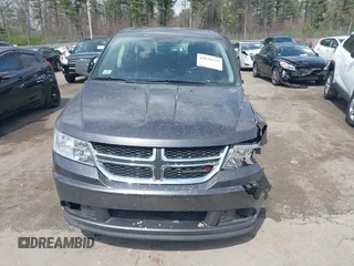 2014 Dodge Journey SE with VIN 3C4PDCABXET219532, listed as a IAAI auction lot 42030341 with 139,145 mi miles and . Bid and sale history available at carsss.com. Image 11.