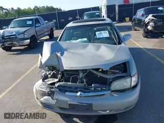 1999 Nissan Altima XE with VIN 1N4DL01D4XC252973, listed as a IAAI auction lot 42005504 with 247,570 mi miles. Bid and sale history available at carsss.com. Image 11.