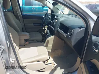 2016 Jeep Compass 75th Anniversary with VIN 1C4NJCBB0GD590321, listed as a IAAI auction lot 41924508 with 50,335 mi miles. Bid and sale history available at carsss.com. Image 5.