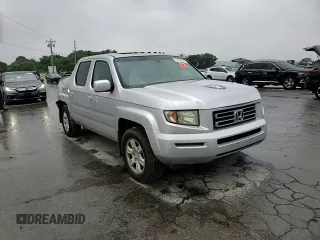 2006 Honda Ridgeline RTL z VIN 2HJYK16546H544183, wystawiony jako Copart lot #57426655 z przebiegiem 162 878 mil mil oraz Szkoda całkowita • Salvage title. Historia ofert i sprzedaży dostępna na DreamBid. Obrazek 13.