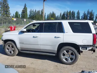 2016 Chevrolet Tahoe LT with VIN 1GNSKBKC9GR272257, listed as a IAAI auction lot 42193967 with 101,967 mi miles and . Bid and sale history available at DreamBid. Image 15.