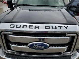2011 Ford F-350 XL with VIN 1FT8W3BT3BEA90065, listed as a Copart auction lot 55763825 with 394,704 mi miles and Salvage title. Bid and sale history available at DreamBid. Image 11.