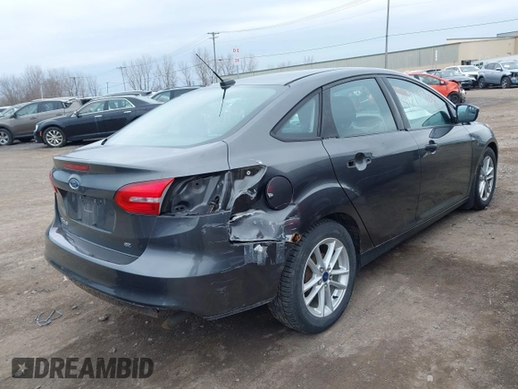 2016 Ford Focus SE with VIN 1FADP3F22GL201887, listed as a IAAI auction lot 41918923 with 119,198 mi miles. Bid and sale history available at carsss.com. Image 4.