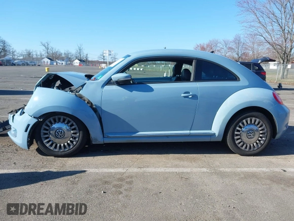 2014 Volkswagen Beetle 2.5L w/Sun with VIN 3VWJP7AT6EM601318, listed as a IAAI auction lot 41902598 with 169,220 mi miles and . Bid and sale history available at DreamBid. Image 14.