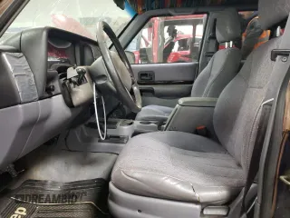 1997 Jeep Cherokee Country with VIN 1J4FJ78S0VL592781, listed as a Copart auction lot 83209464 with 287,206 mi miles and Salvage Title. Bid and sale history available at carsss.com. Image 7.