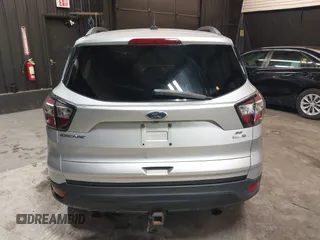 2018 Ford Escape SE z VIN 1FMCU9GD0JUD33111, wystawiony jako IAAI lot #42277404 z przebiegiem 71 896 mil mil oraz . Historia ofert i sprzedaży dostępna na DreamBid. Obrazek 16.