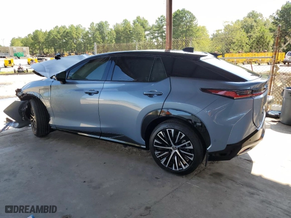 2023 Lexus RZ with VIN JTJAAAAB6PA002943, listed as a Copart auction lot 60852184 with 3,760 mi miles and Salvage Title. Bid and sale history available at carsss.com. Image 2.