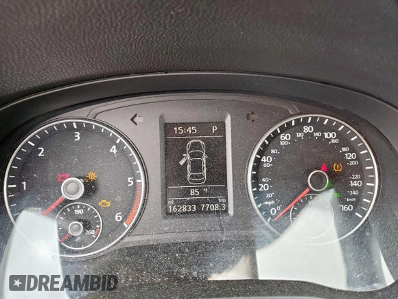 2014 Volkswagen Passat SE z VIN 1VWBN7A38EC076113, wystawiony jako Copart lot #64878365 z przebiegiem 162 833 mil mil oraz Czysty tytuł • Clean title. Historia ofert i sprzedaży dostępna na DreamBid. Obrazek 9.