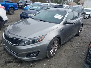 2014 Kia Optima SXL Turbo with VIN 5XXGR4A68EG272347, listed as a IAAI auction lot 41847119 with 131,197 mi miles and . Bid and sale history available at DreamBid. Image 2.