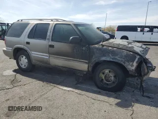 2000 GMC Jimmy SL with VIN 1GKCS13W5Y2349270, listed as a Copart auction lot 45498755 with 0 mi miles and Salvage Title. Bid and sale history available at carsss.com. Image 4.