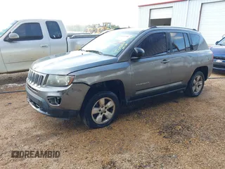 2014 Jeep Compass Sport with VIN 1C4NJCBA9ED594548, listed as a IAAI auction lot 41953586 with 194,593 mi miles. Bid and sale history available at carsss.com. Image 2.