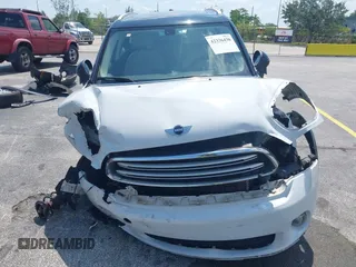 2015 MINI Countryman z VIN WMWZB3C53FWR43884, wystawiony jako IAAI lot #42336430 z przebiegiem 111 934 mil mil oraz . Historia ofert i sprzedaży dostępna na DreamBid. Obrazek 6.