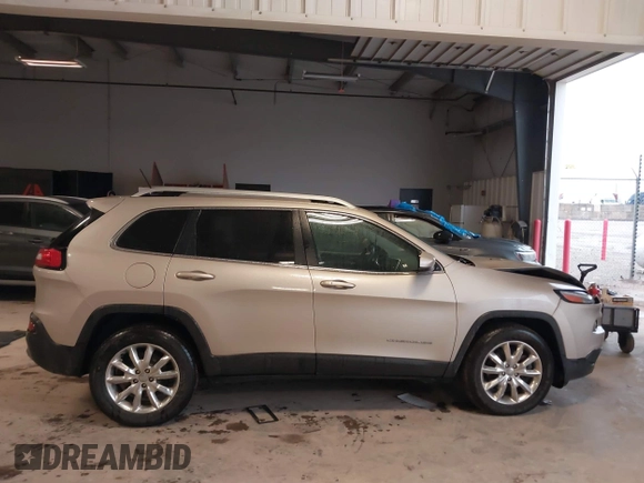 2014 Jeep Cherokee Limited z VIN 1C4PJMDS9EW276552, wystawiony jako IAAI lot #41826505 z przebiegiem 113 181 mil mil oraz . Historia ofert i sprzedaży dostępna na DreamBid. Obrazek 13.