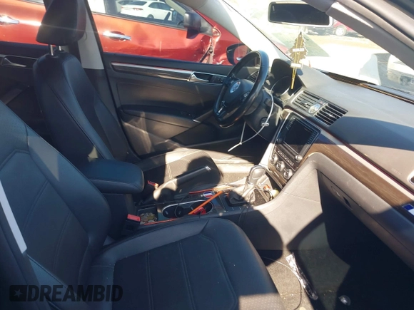 2016 Volkswagen Passat SE with VIN 1VWBT7A30GC049027, listed as a IAAI auction lot 41878460 with 125,261 mi miles and . Bid and sale history available at DreamBid. Image 5.