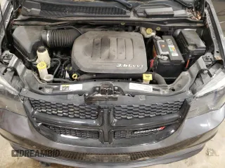 2015 Dodge Grand Caravan SE with VIN 2C4RDGBG6FR668740, listed as a Copart auction lot 50211885 with 129,695 mi miles and Salvage Title. Bid and sale history available at DreamBid. Image 12.