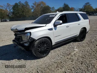 2023 GMC Yukon Denali Ultimate with VIN 1GKS2EKL0PR132029, listed as a Copart auction lot 77234034 with 58,071 mi miles and Salvage Title. Bid and sale history available at carsss.com. Image 1.