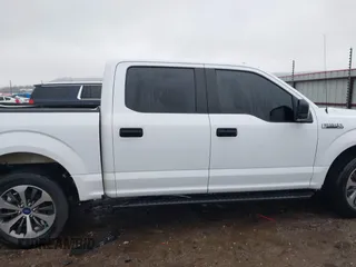 2019 Ford F-150 XL with VIN 1FTEW1C52KKD70455, listed as a IAAI auction lot 41457239 with 97,295 mi miles and . Bid and sale history available at DreamBid. Image 14.