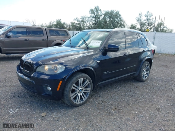 2011 BMW X5 35i with VIN 5UXZV4C53BL743050, listed as a IAAI auction lot 40074369 with 118,970 mi miles. Bid and sale history available at carsss.com. Image 2.