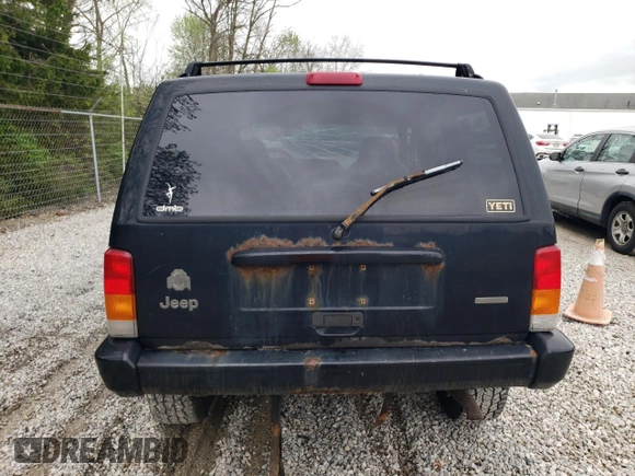 2001 Jeep Cherokee Sport с VIN 1J4FF48S31L615450, выставлен на аукционе Copart как лот 55835585 с пробегом 246 694 миль миль и Списание • Salvage title. История ставок и продаж доступна на DreamBid. Изображение 6.