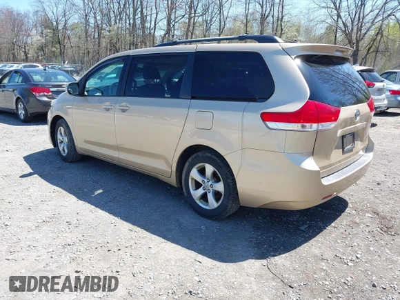 2012 Toyota Sienna LE AAS with VIN 5TDKK3DC9CS184090, listed as a IAAI auction lot 42123891 with 162,065 mi miles. Bid and sale history available at carsss.com. Image 3.