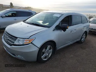 2012 Honda Odyssey Touring with VIN 5FNRL5H96CB095264, listed as a IAAI auction lot 41403450 with 246,199 mi miles and . Bid and sale history available at carsss.com. Image 6.