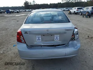 2006 Suzuki Forenza z VIN KL5JD56Z66K299816, wystawiony jako Copart lot #81893914 z przebiegiem 156 416 mil mil oraz Szkoda całkowita • Salvage title. Historia ofert i sprzedaży dostępna na DreamBid. Obrazek 6.