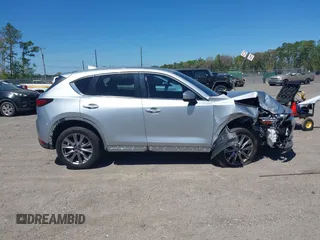 2019 Mazda CX-5 Grand Touring with VIN JM3KFADM1K1606082, listed as a IAAI auction lot 41875878 with 66,089 mi miles. Bid and sale history available at carsss.com. Image 13.
