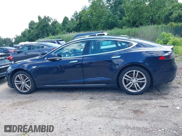 2013 Tesla Model S with VIN 5YJSA1CN0DFP21851, listed as a IAAI auction lot 42557791 with 106,328 mi miles and . Bid and sale history available at DreamBid. Image 15.