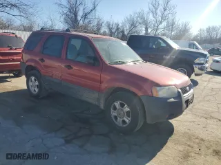 2004 Ford Escape XLT with VIN 1FMYU03134DA20149, listed as a Copart auction lot 42731295 with 159,671 mi miles and Salvage Title. Bid and sale history available at carsss.com. Image 4.