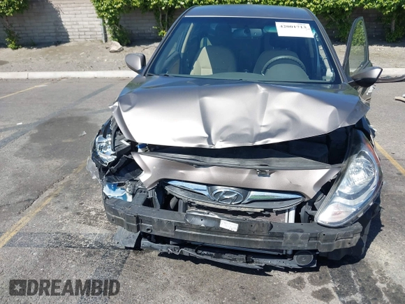 2013 Hyundai Accent GLS with VIN KMHCU4AE3DU314187, listed as a IAAI auction lot 42001713 with 99,845 mi miles. Bid and sale history available at carsss.com. Image 13.