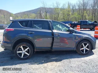2018 Toyota RAV4 LE with VIN JTMBFREV0JJ722483, listed as a IAAI auction lot 41982973 with 83,012 mi miles. Bid and sale history available at carsss.com. Image 13.