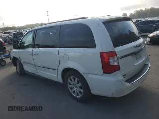 2013 Chrysler Town & Country Touring with VIN 2C4RC1BG4DR674873, listed as a Copart auction lot 71492174 with 212,372 mi miles and Salvage Title. Bid and sale history available at DreamBid. Image 2.