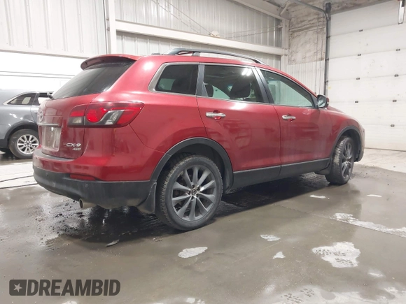 2015 Mazda CX-9 Grand Touring z VIN JM3TB3DAXF0464215, wystawiony jako IAAI lot #42043092 z przebiegiem 119 269 mil mil oraz . Historia ofert i sprzedaży dostępna na DreamBid. Obrazek 4.