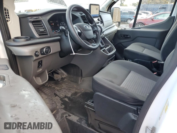 2021 Ford Transit Cargo with VIN 1FTBR1CG7MKA88875, listed as a Copart auction lot 84705324 with 23,654 mi miles and Salvage Title. Bid and sale history available at DreamBid. Image 8.