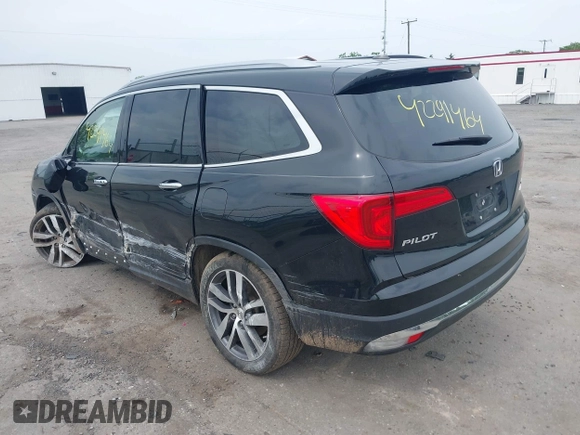 2017 Honda Pilot Touring with VIN 5FNYF6H90HB052474, listed as a IAAI auction lot 42291464 with 103,288 mi miles and . Bid and sale history available at DreamBid. Image 3.