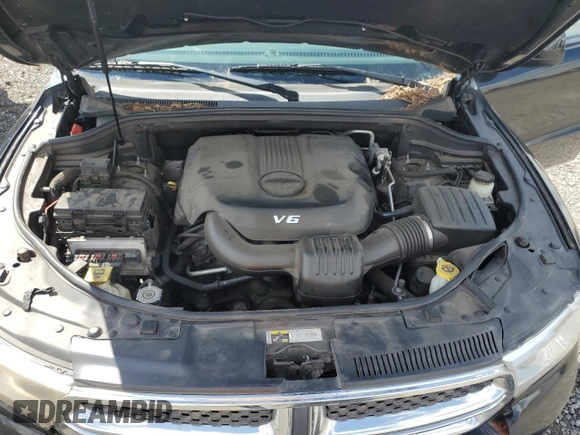 2013 Dodge Durango SXT z VIN 1C4RDHAGXDC698613, wystawiony jako Copart lot #55156025 z przebiegiem 189 685 mil mil oraz Szkoda całkowita • Salvage title. Historia ofert i sprzedaży dostępna na DreamBid. Obrazek 12.