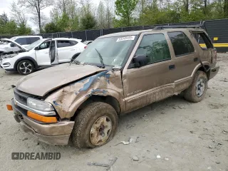 2004 Chevrolet Blazer LS z VIN 1GNDT13X64K168315, wystawiony jako Copart lot #53249495 z przebiegiem 163 891 mil mil oraz Szkoda całkowita • Salvage title. Historia ofert i sprzedaży dostępna na DreamBid. Obrazek 1.
