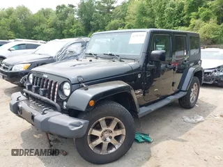 2015 Jeep Wrangler Unlimited Sahara with VIN 1C4HJWEG3FL661568, listed as a IAAI auction lot 42387810 with 140,927 mi miles and . Bid and sale history available at DreamBid. Image 18.