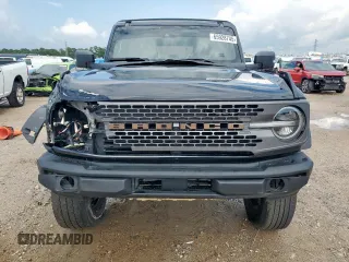 2021 Ford Bronco с VIN 1FMEE5DP8MLB02805, выставлен на аукционе Copart как лот 65928745 с пробегом 52 200 миль миль и Списание • Salvage title. История ставок и продаж доступна на DreamBid. Изображение 5.