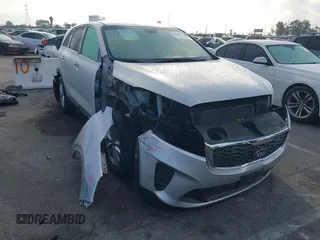 2019 Kia Sorento LX z VIN 5XYPG4A33KG575023, wystawiony jako IAAI lot #41540167 z przebiegiem 63 335 mil mil oraz . Historia ofert i sprzedaży dostępna na DreamBid. Obrazek 1.
